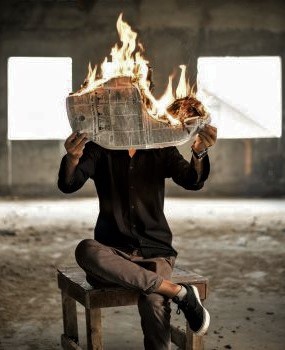 burning newspaper